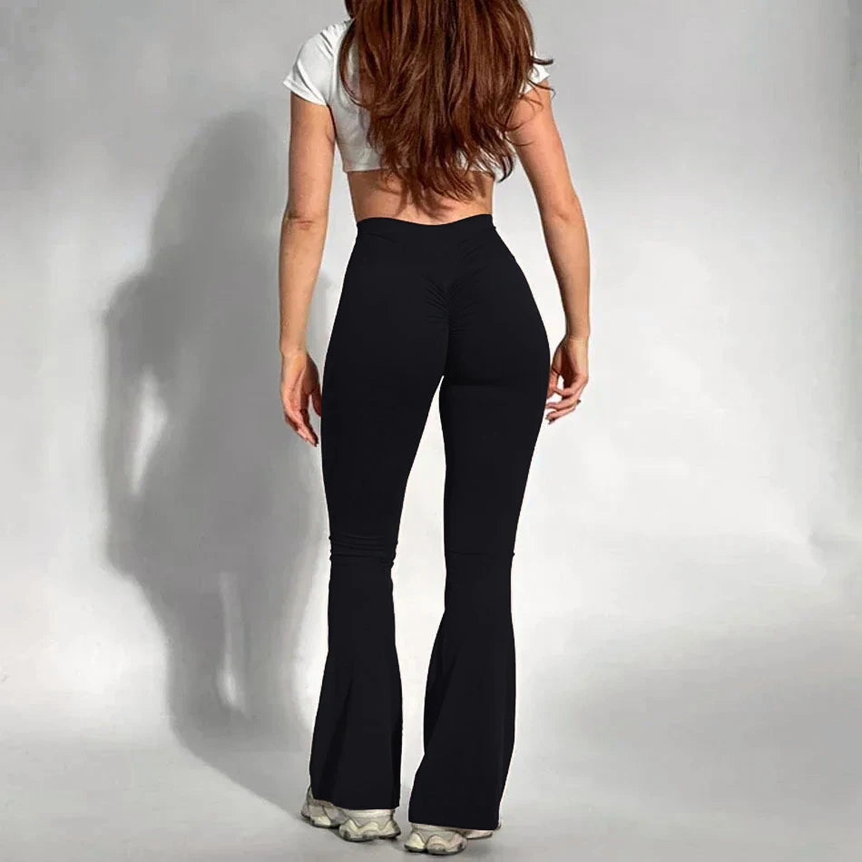 PANTALON DE YOGA LARGE ET ALLONGEANT AUX JAMBES